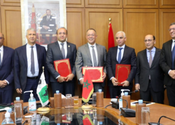 فوزي لقجع يوقع مع البنك الإفريقي للتنمية اتفاقية شراكة لدعم إنتاج الحبوب والحماية الاجتماعية في المملكة