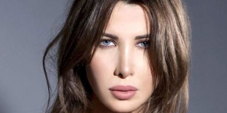 نانسي عجرم تدعم المنتخب المغربي